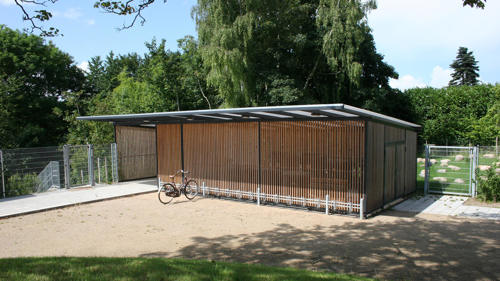 Cykeloverdækning og opbevaring under samme tag